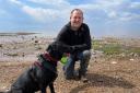 Narborough Fisheries manager Russell Peberdy with his dog Dexter