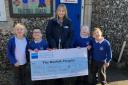 Pupils from the school even got to pose with a giant cheque following their fundraising success