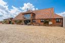 A stunning £1.1 million barn conversion in the Norfolk countryside has gone up for sale