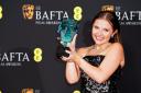 Mia McKenna-Bruce after winning the EE Rising Star award during the Bafta Film Awards 2024 (Ian West/PA)