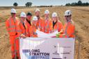 Council leaders on the route of the new bypass currently under construction in Long Stratton