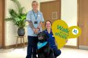 Debbie and Rachel from Severn Hospice with therapy dog Rufus.