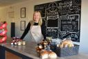 Owner Amie Phillips behind the counter at Platinum Stores & Bakes in Freethorpe