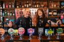 Hop Rocket co-owner Mark White and general manager Molly Taylor behind the bar Picture: Sonya Duncan