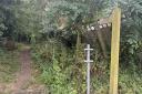 Police are investigating the damaged 'No Horses' sign at a footpath in Hempnall