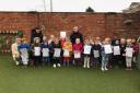 Staff and children at Little Owls Day Nursery, in Toftwood, celebrate its outstanding grade following its latest Ofsted inspection