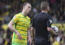 Norwich City are assessing Ashley Barnes after he limped out of their draw with Swansea.
