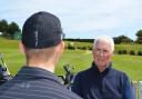 New Mundesley Golf Club chaplain Derek Blois talking to a member