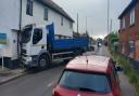 A lorry has crashed into a property in Shipdham
