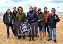 Members of the band Ferocious Dog at the beach clean at Old Hunstanton