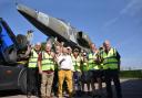 Volunteers at the RAF Cotishall Heritage Centre celebrate the arrival of the iconic Jaguar aircraft
