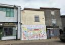 The prominent commercial property at 87 High Street in Lowestoft (centre) has sold at auction. Picture: Auction House East Anglia