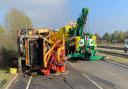 Live updates as overturned lorry blocks A11