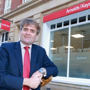Guy Gowing outside Arnolds Keys’ new office on King Street in Norwich