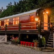 A converted 1960s railway carriage has gained national attention as one of the nation's best stays