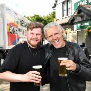 Jimmy Bullard and Statman Dave with their free pints ahead of the Euro 2024