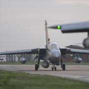 A jet lands at RAF Marham