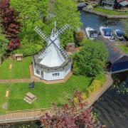 The Windmill is on the Norfolk Broads, with riverside views