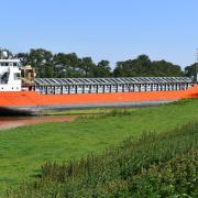 A cargo ship has been stuck in the River Nene since this morning