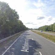 A man has been charged for several offences after a crash on the A11
