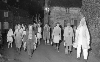 Something wicked this way comes: a torchlight procession at Corpusty in November 1976