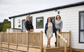 Willerby Business Development Manager Gemma Pudsey, centre, with Darren Williams, General Manager of Pinewoods Holiday Park, and Sue Pennington, Pinewoods’ Sustainability Manager, at the Willerby All-E Dorchester on site at Pinewoods.