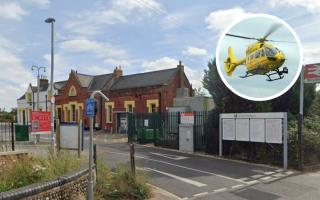 An air ambulance has been called and train services have been cancelled at Attleborough Railway Station