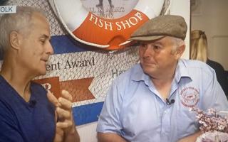 Chef Phil Vickery buys Cromer crab from John Davies of Davies Fish Shop