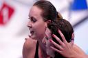 Jessica-Jane Applegate, left, celebrates her bronze with GB team-mate Bethany Firth, who took gold