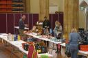 Volunteers helping charity Open Norwich prepare parcels at St Andrews Hall which are going to be sent out on Christmas Day to those who need it.