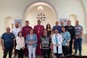 Bishop Graham with Al Ahli Hospital senior medical staff and Archbishop Hosam