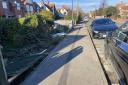 The car destroyed the picket fence of a property in Church Road before continuing into the front garden