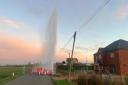 Spray from a burst water main was higher that nearby homes near Emneth, Wisbech. Photo / Video: Jason Unsworth