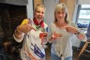 Two regular drinkers at The Angel Inn, Hailey Ives and Jo Jackson, with their rosé