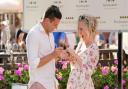 A couple who met on a bench in Newmarket's High Street two years ago are now engaged following a surprise proposal in the winner's enclosure of the Newmarket Racecourses.