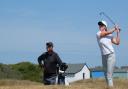 Amelia Williamson watched by caddie Gary Brayshaw