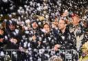 The crowd enjoying the snow machines at the Norwich Christmas lights event in 2023