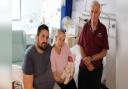Kyle Hurst, Charley Almey and baby Esme with hospital volunteer David Beveridge (l-r)