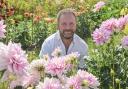 Owner Tony Calver in the 'Dahlia Addiction' field at The Old Vineyard Nursery