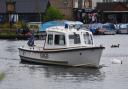 A Broads Authority ranger at the River Bure at Hoveton.