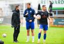 Adam Lakeland, left, coach Josh Coulson and assistant manager Sam Walker plotting another success