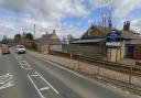 The road outside the former Wormegay Primary School is closed following a crash