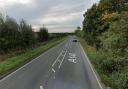 Police remain on scene at a crash on a major road