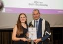 Beth Buchanan collects her award from RCGP president Richard Vautrey