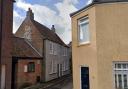 The grey house on Priory Lane in King's Lynn