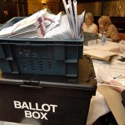 Votes being counted at a local government election. An increased number of people are expected to vote by post at the local government elections in May. Picture: PA