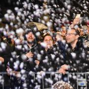 The crowd enjoying the snow machines at the Norwich Christmas lights event in 2023