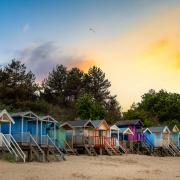 With its stripey beach huts, quaint harbour and golden sands edged by pine trees, Wells-next-the-Sea is a perfect seaside town