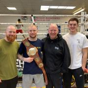 New Southern Area champion Mikie Webber-Kane with, from left, Tony Norman, Graham Everett and Joe Everett