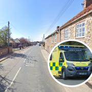 Two people have been taken to hospital after a car crash in a Norfolk village
